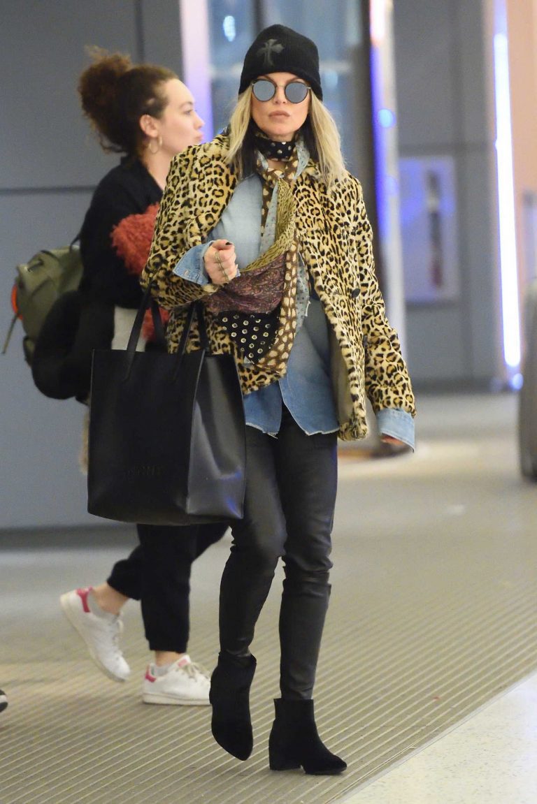 Fergie Wears a Leopard Print Jacket at JFK airport in NYC 12/17/2017-1