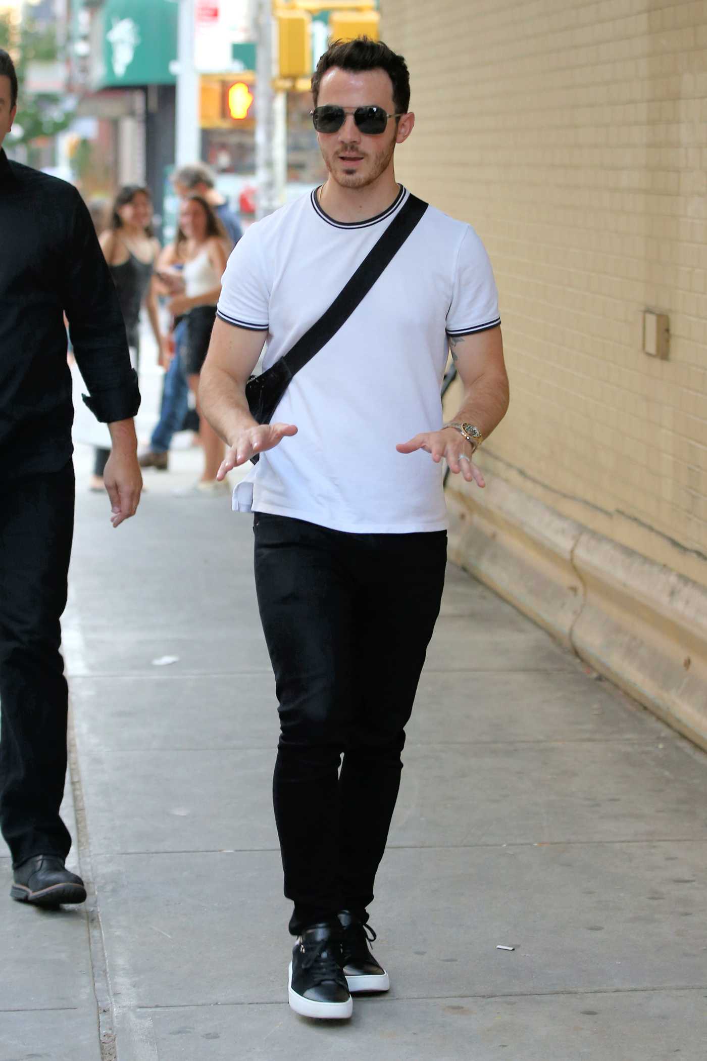 Kevin Jonas in a White Tee Was Seen Out in New York 08/16/2019