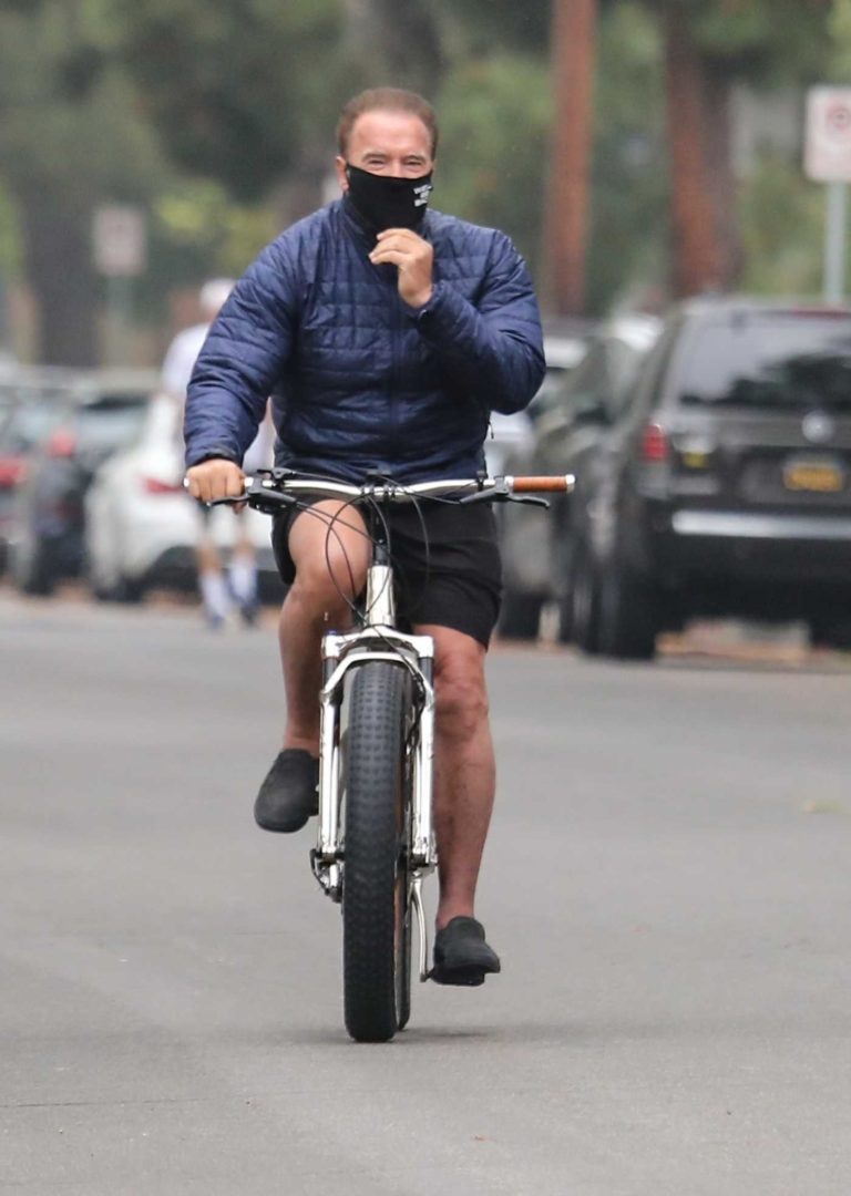 Arnold Schwarzenegger in a Black Face Mask