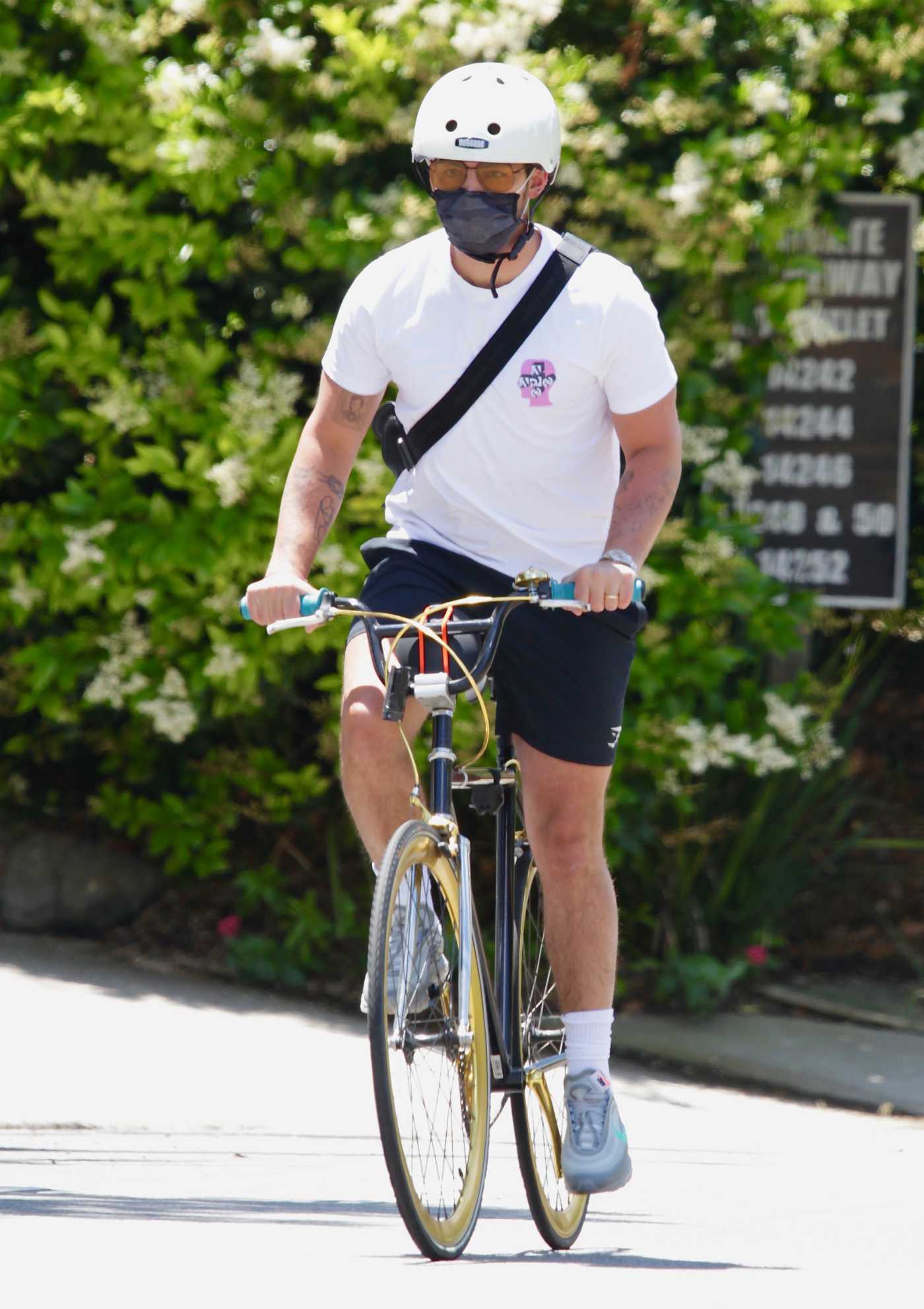 Joe Jonas in a White Tee Does a Bike Ride in Encino 05/19/2020