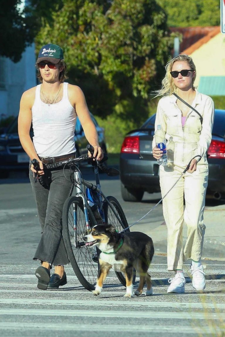 Maika Monroe in a White Sneakers