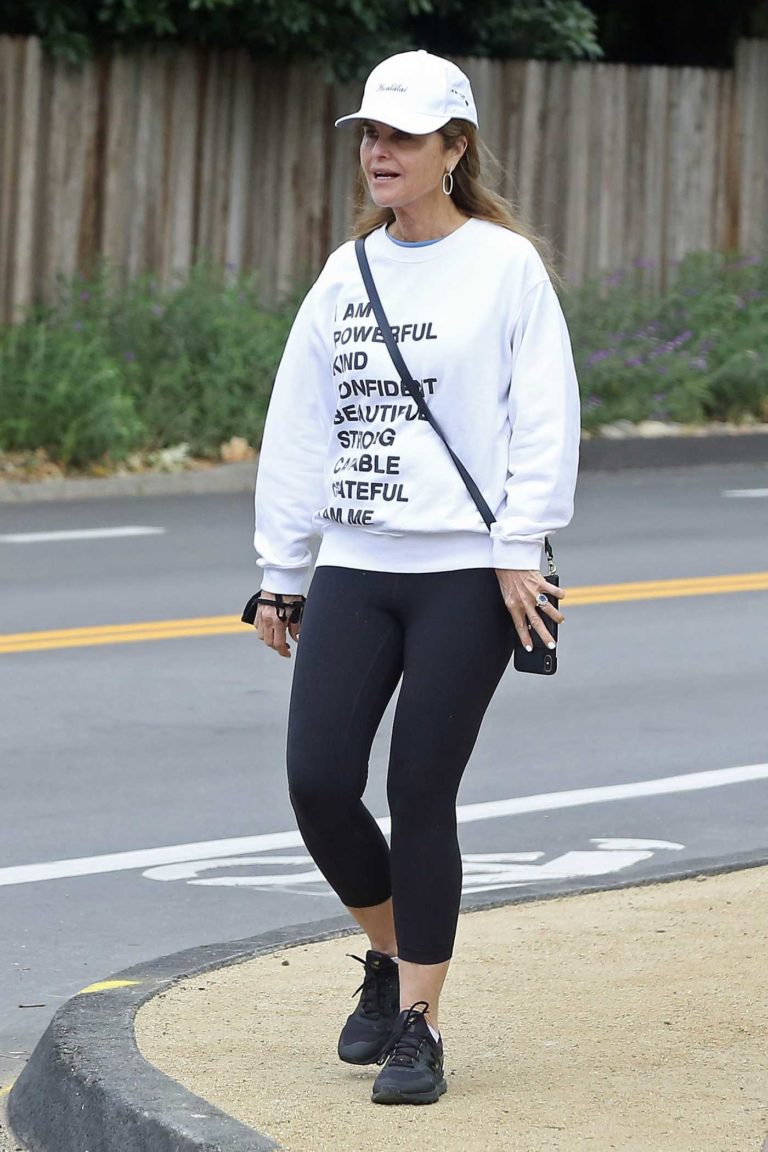 Maria Shriver in a White Sweatshirt