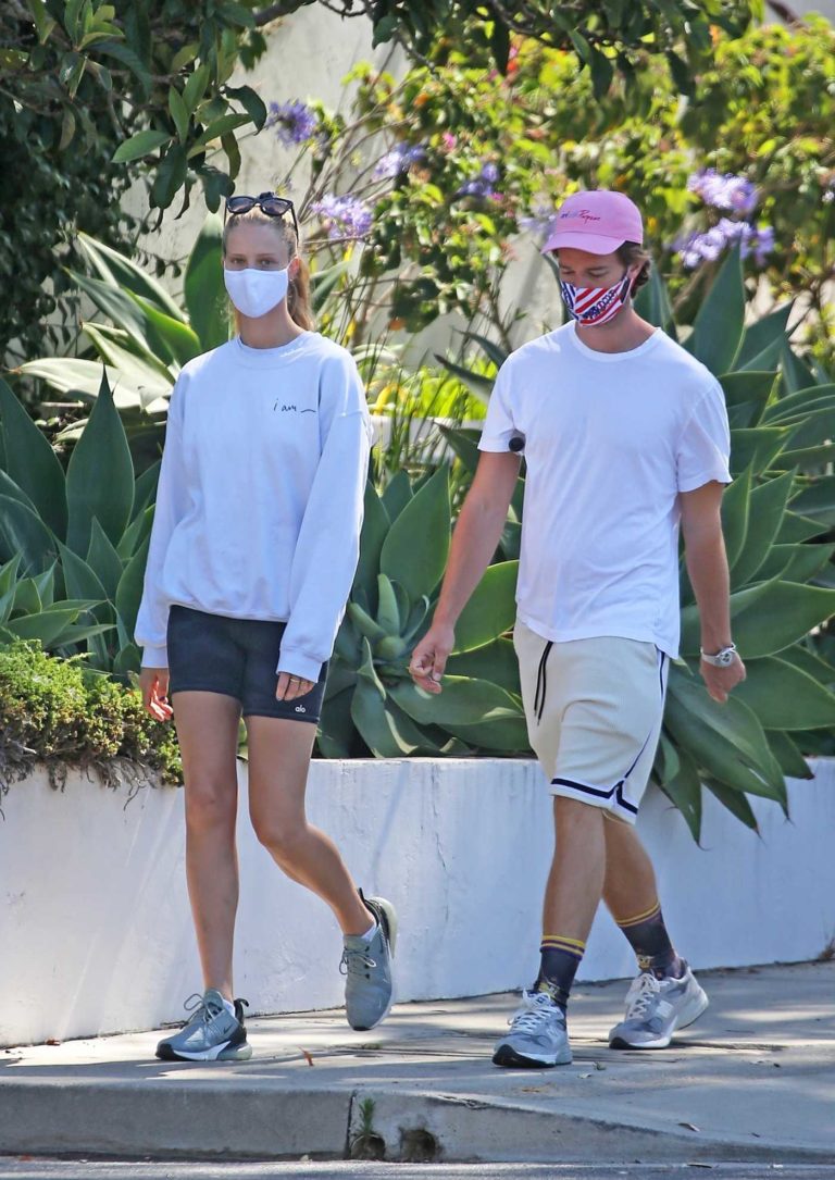 Abby Champion in a Protective Mask