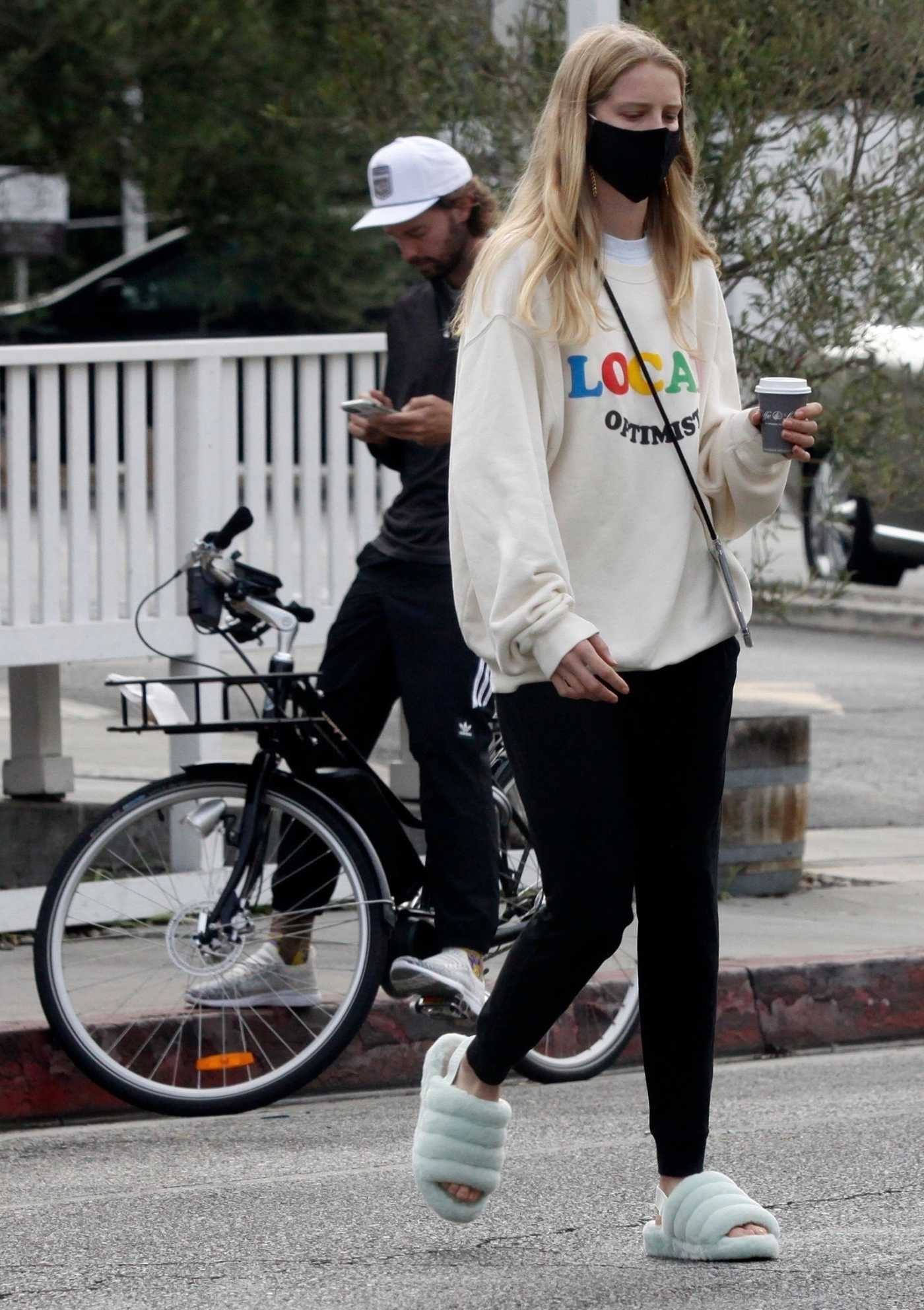 Abby Champion in a White Sweatshirt Does a Bike Ride Out with Patrick Schwarzenegger in Los Angeles 08/31/2020