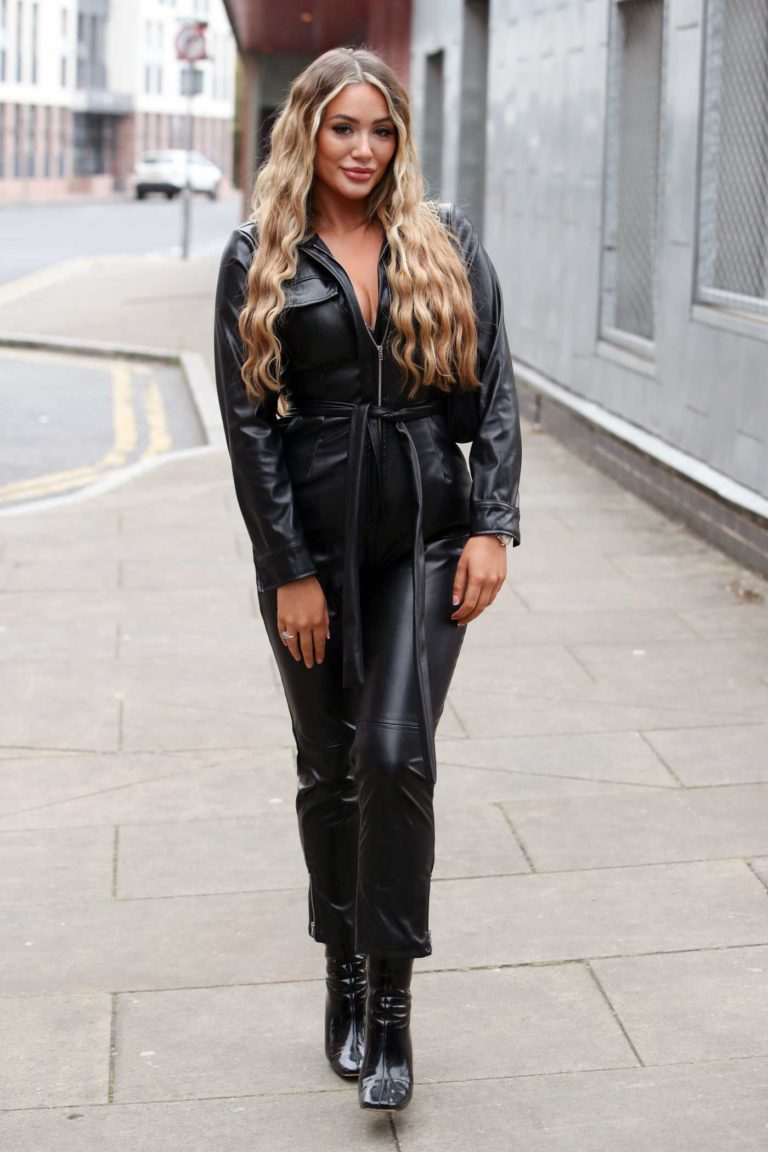 Frankie Sims in a Black Leather Jumpsuit