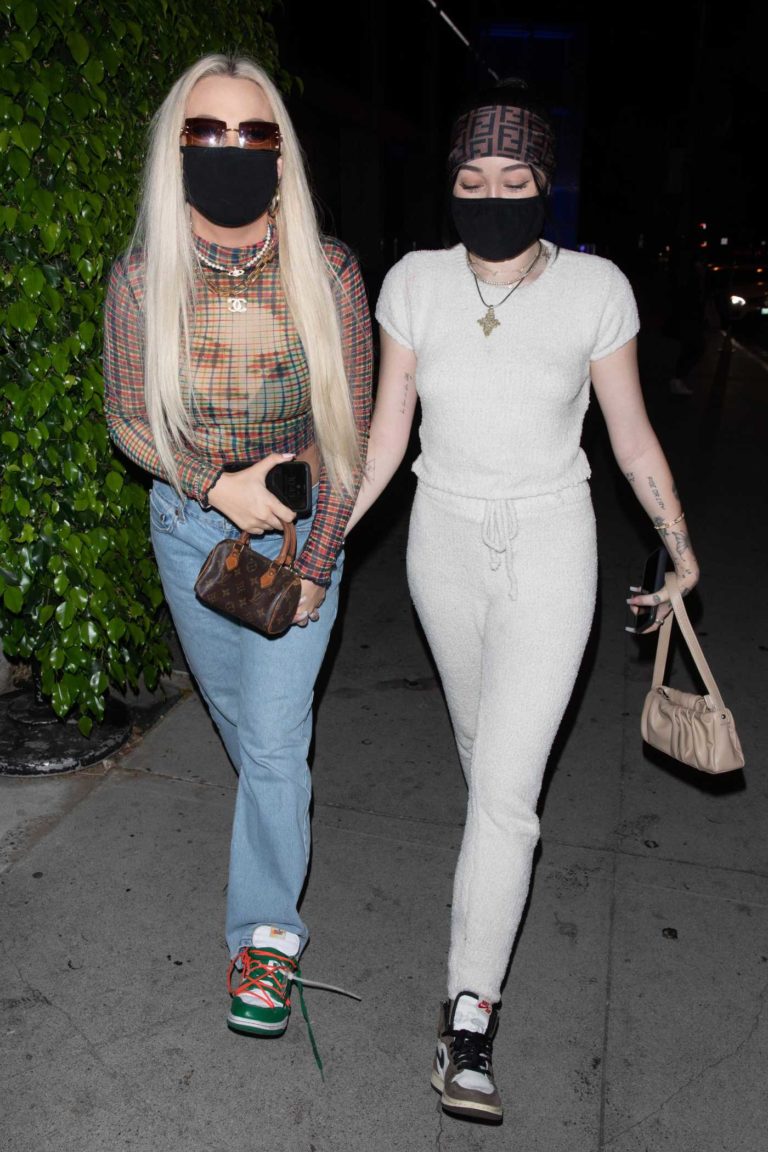 Noah Cyrus in a White Sweatsuit