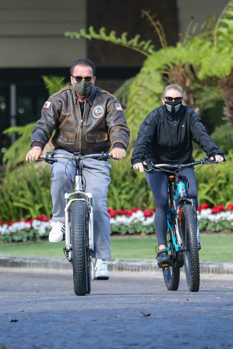 Arnold Schwarzenegger in a White Adidas Sneakers