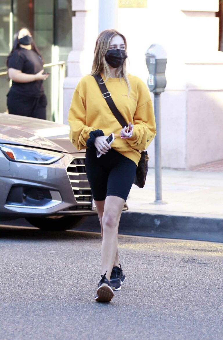 Delilah Belle Hamlin in a Yellow Sweatshirt