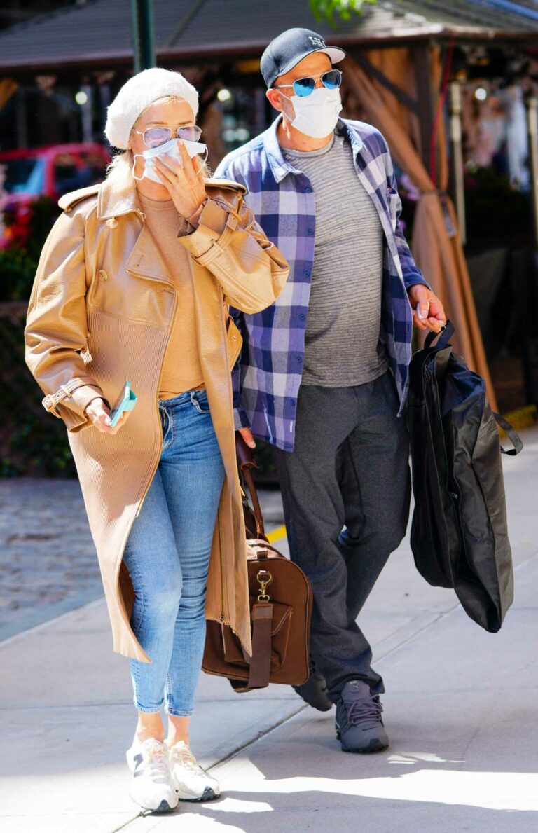 Yolanda Hadid in a Yellow Coat