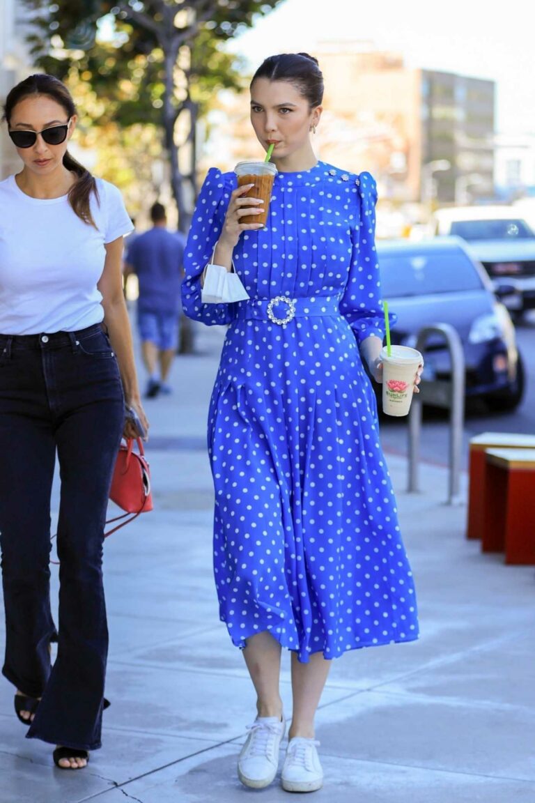 Maya Henry in a Blue Polka Dot Dress