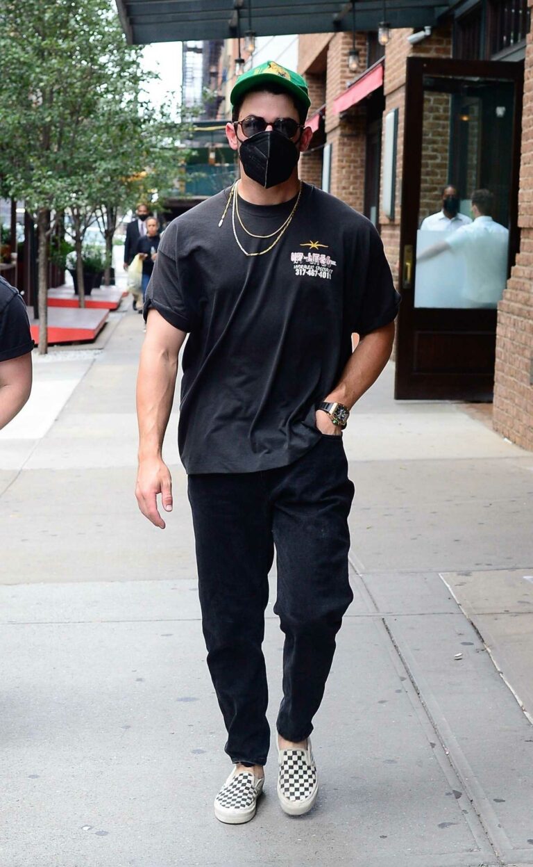 Nick Jonas in a Black Tee