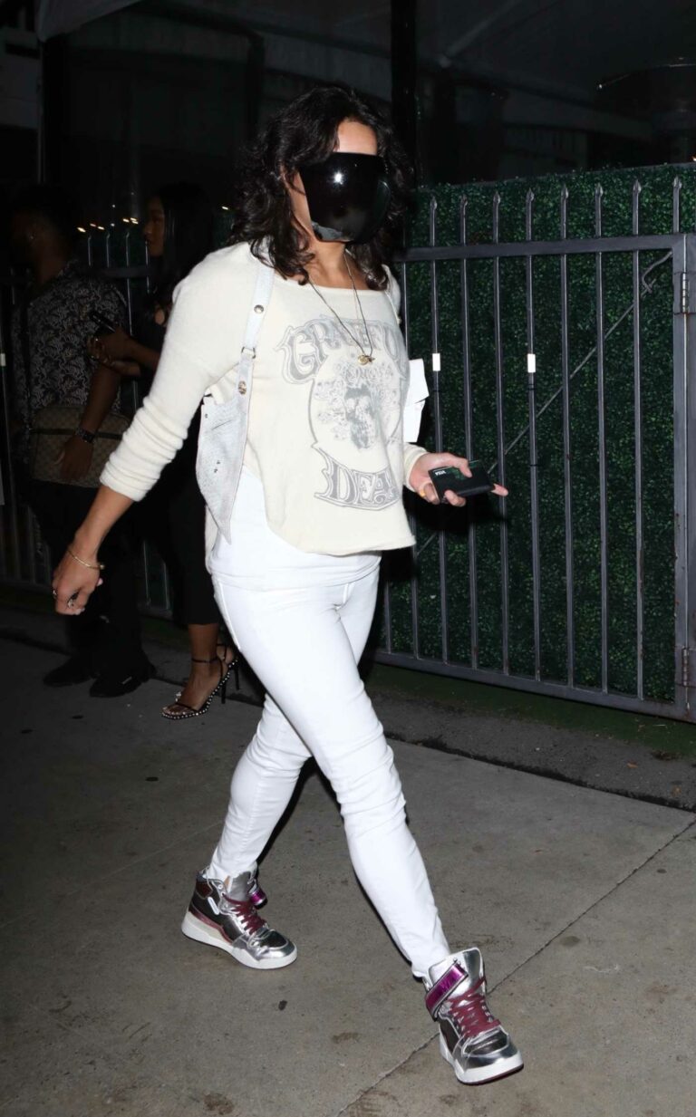 Michelle Rodriguez in a Black Protective Mask