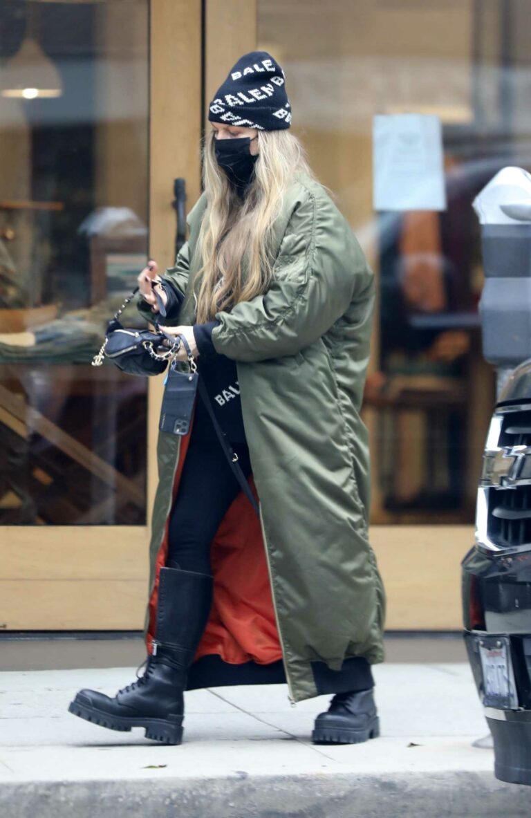 Fergie in an Olive Puffer Coat