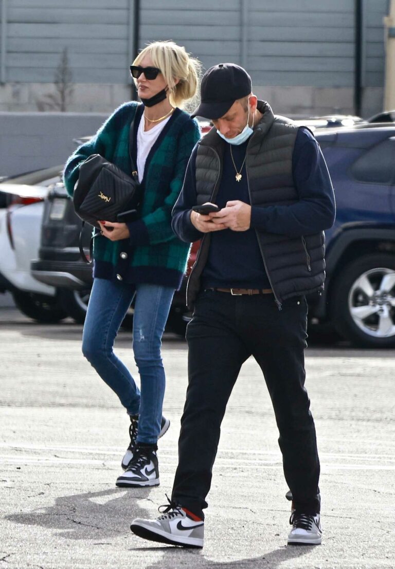 Kimberly Stewart in a Green Cardigan