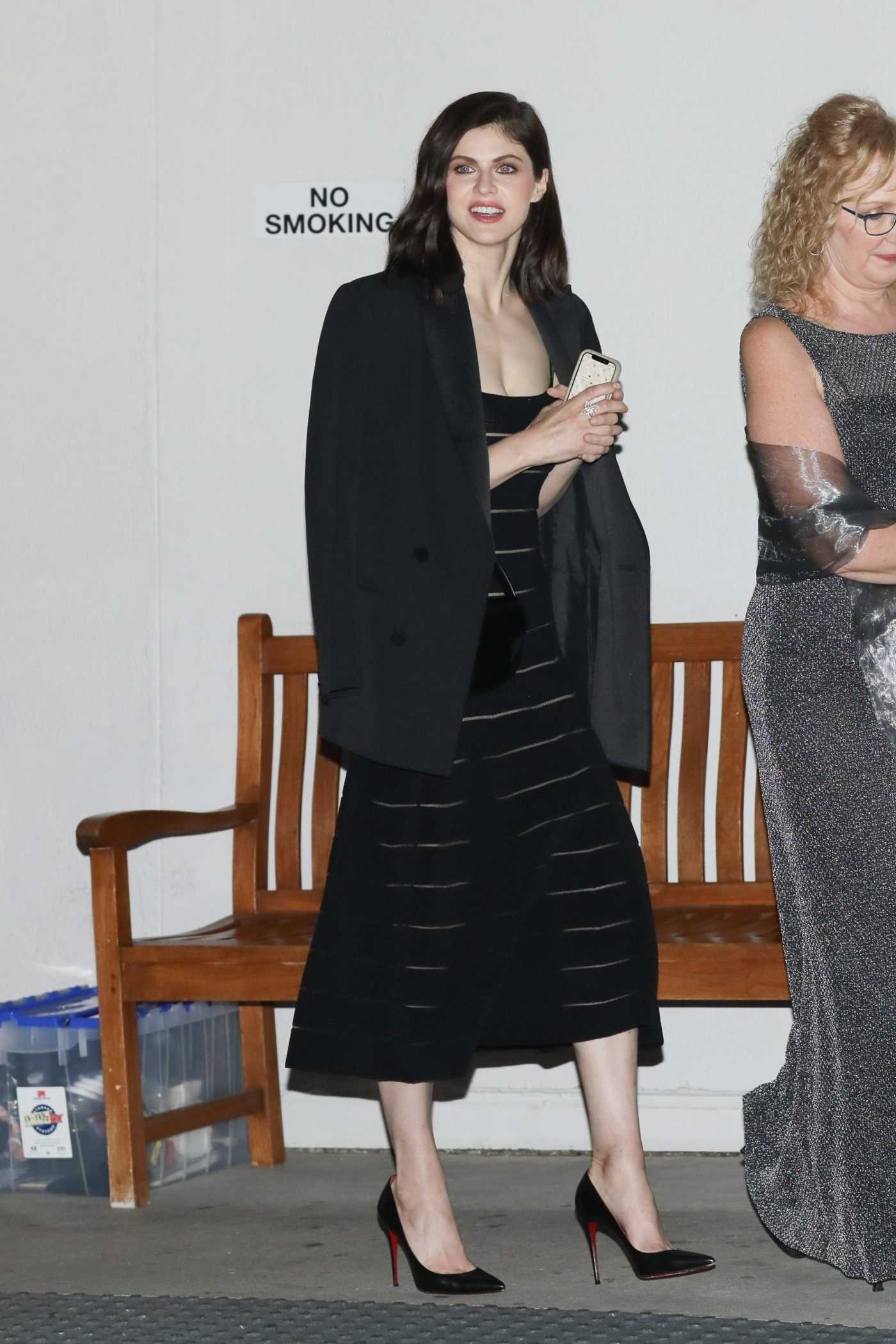 Alexandra Daddario in a Black Blazer Leaves the Giorgio Armani Oscars Pre-Party in Beverly Hills 03/26/2022