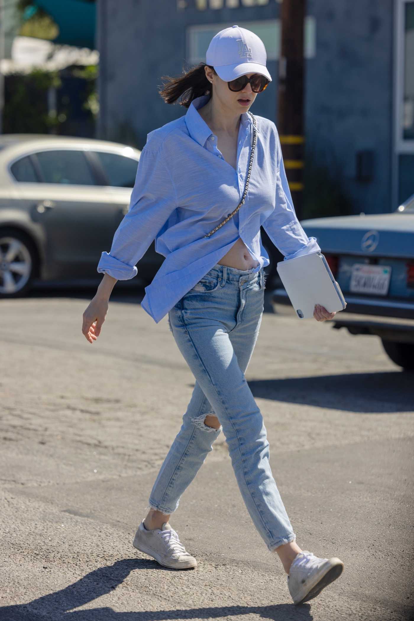 Alexandra Daddario in a Blue Cap Was Seen Out in Santa Monica 03/16/2022