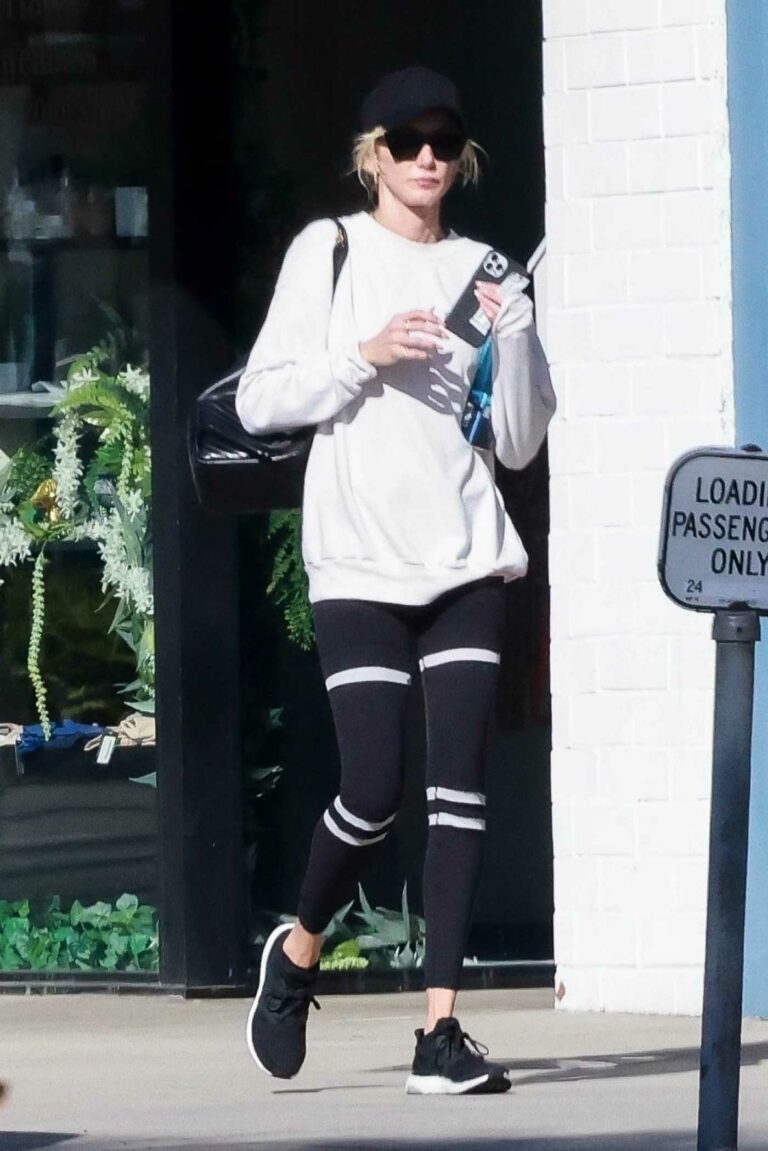 Kimberly Stewart in a White Sweatshirt