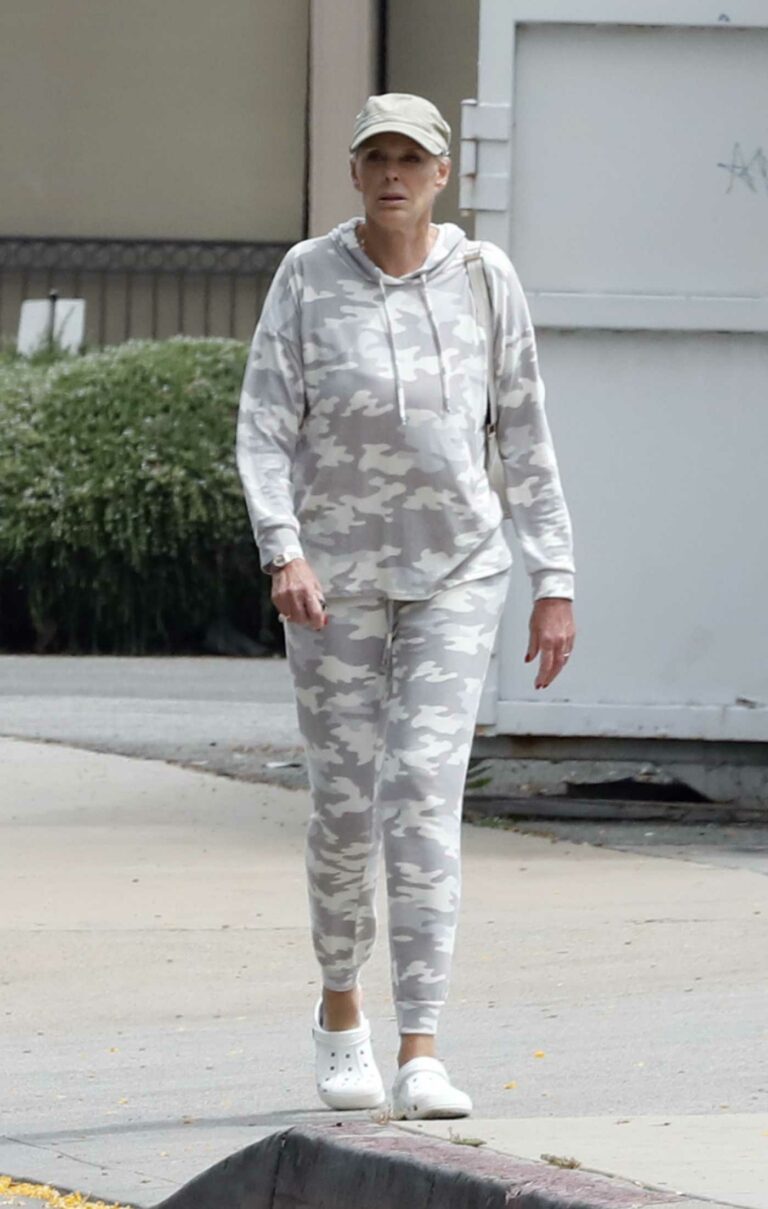 Brigitte Nielsen in a Grey Sweatsuit