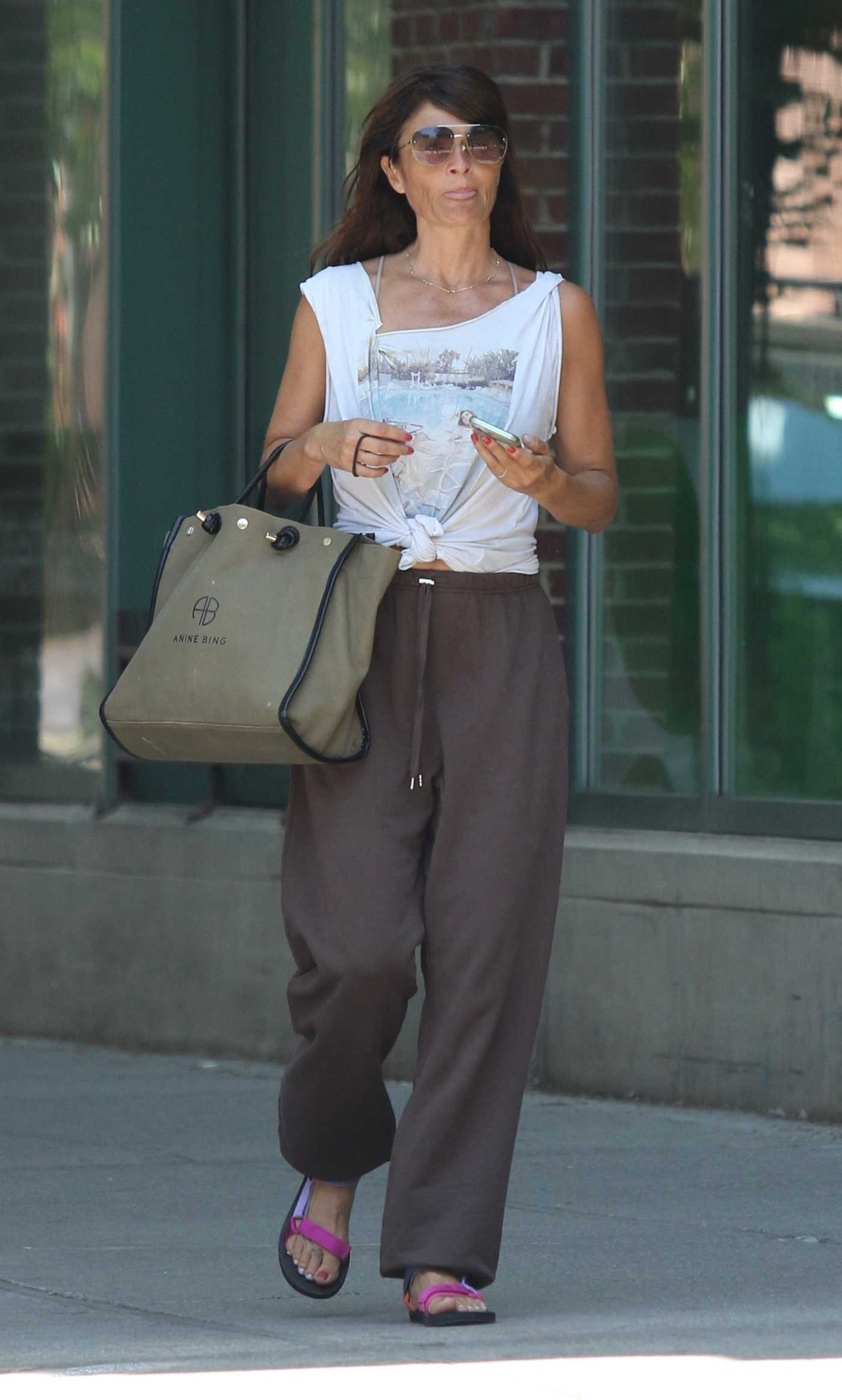 Helena Christensen in a White Top Was Seen Out in Manhattan’s West Village 06/20/2022