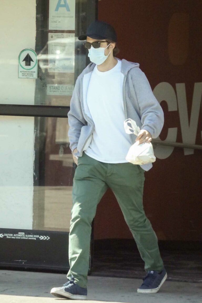 Robert Pattinson in a Black Cap