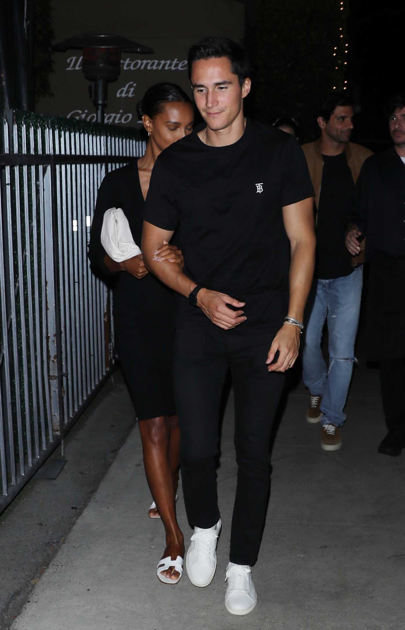 Jasmine Tookes in a Black Dress Arrives for a Romantic Dinner Date  to Giorgio Baldi Restaurant  with Juan David Borrero in Santa Monica 08/12/2022