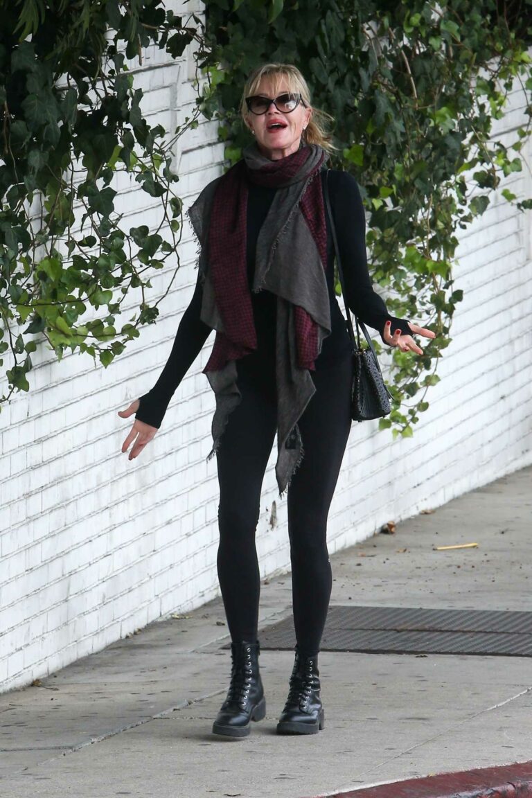Melanie Griffith in a Black Outfit