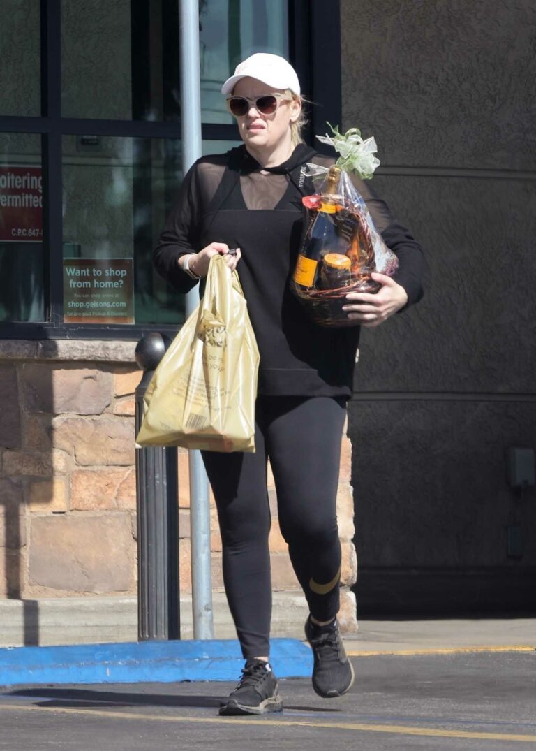 Rebel Wilson in a Black Sneakers