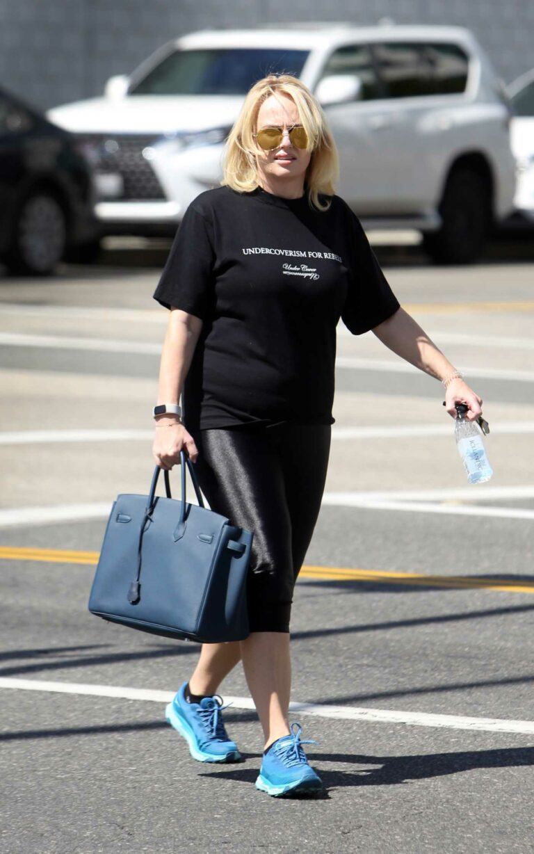 Rebel Wilson in a Blue Sneakers