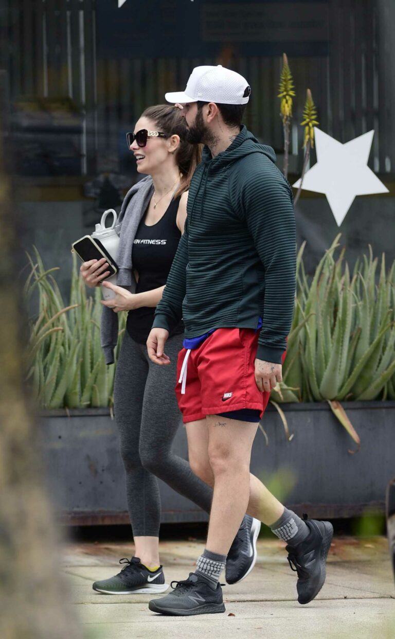 Ashley Greene in a Black Nike Sneakers