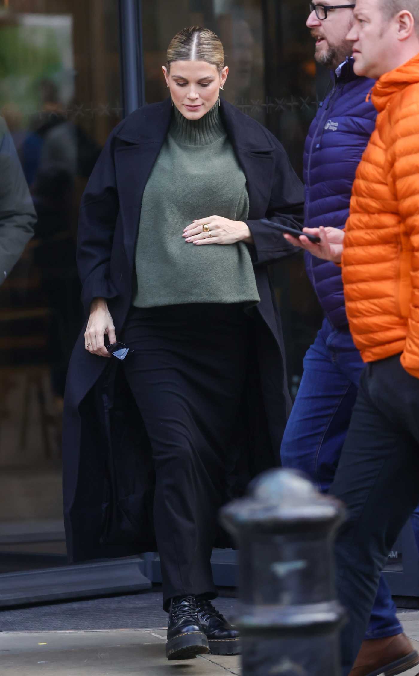 Ashley James in an Olive Sweater Stepping Out from Soho Radio in London 02/09/2023