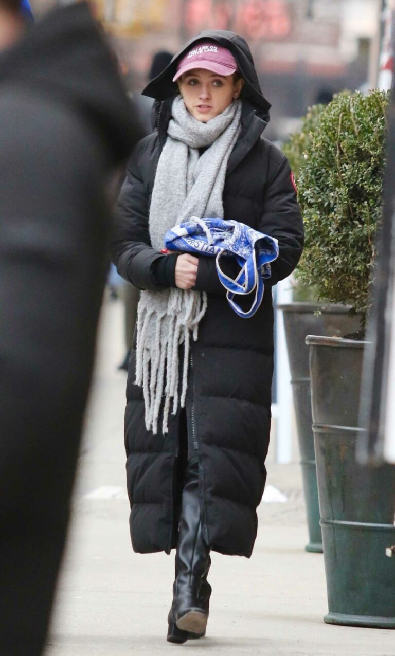 Natalia Dyer in a Black Puffer Coat