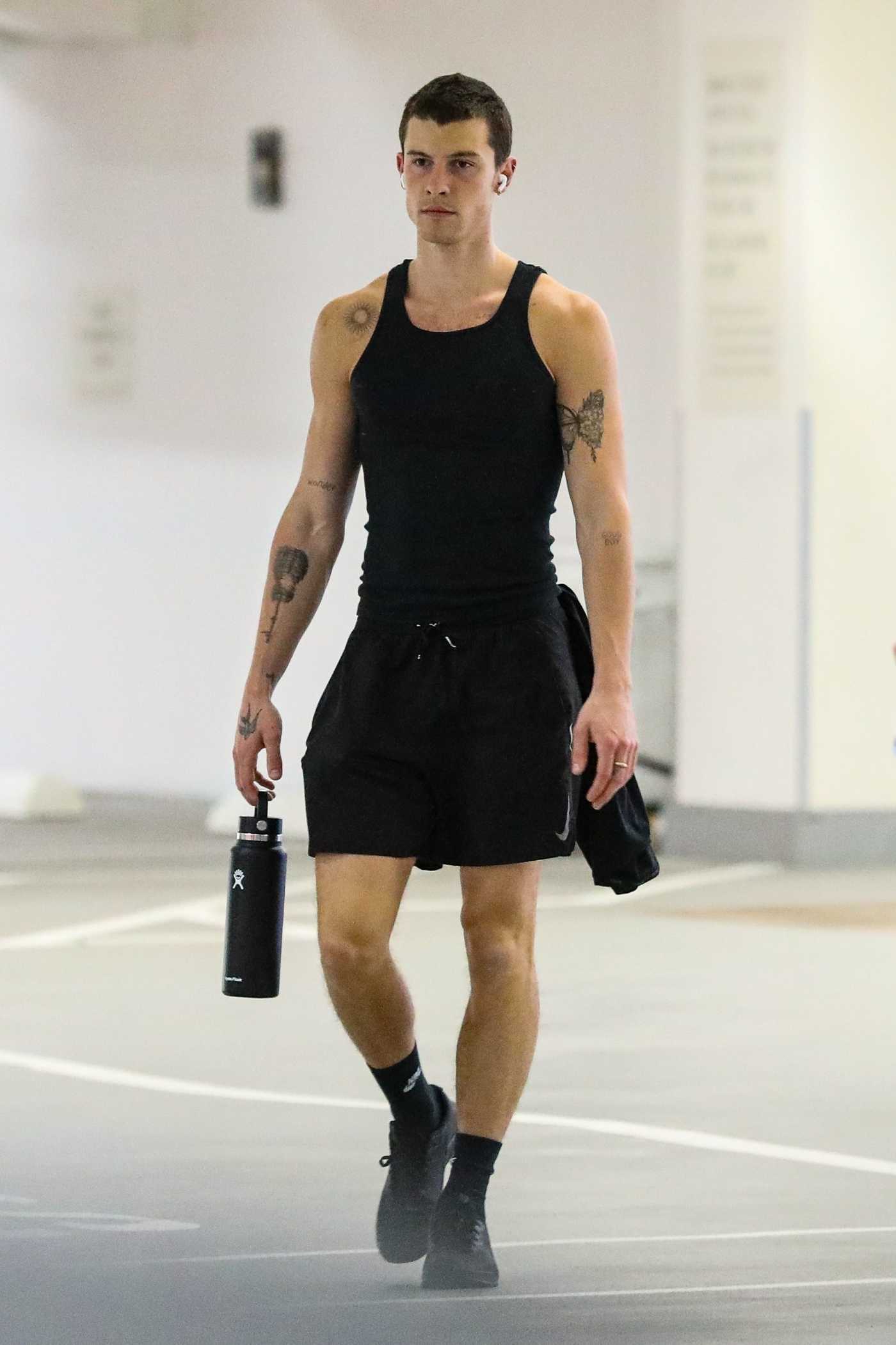 Shawn Mendes in a Black Tank Top Leaves a Spa Center in Brentwood 02/03/2023
