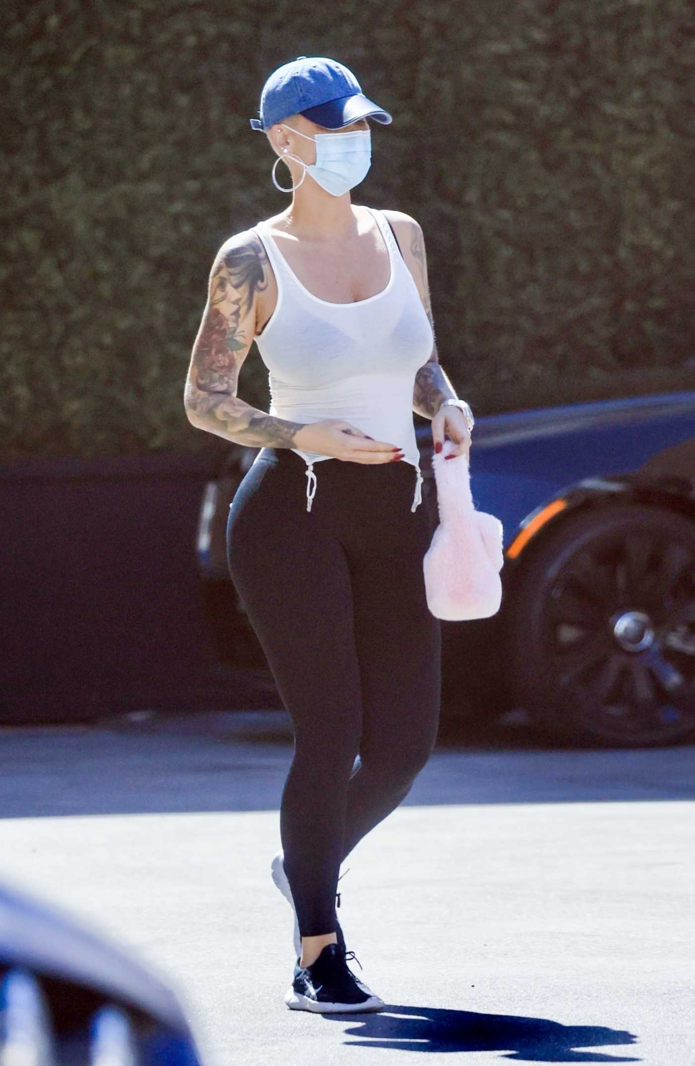 Amber Rose in a Blue Cap Leaves Epione Skin Care Clinic in Beverly Hills 03/27/2023
