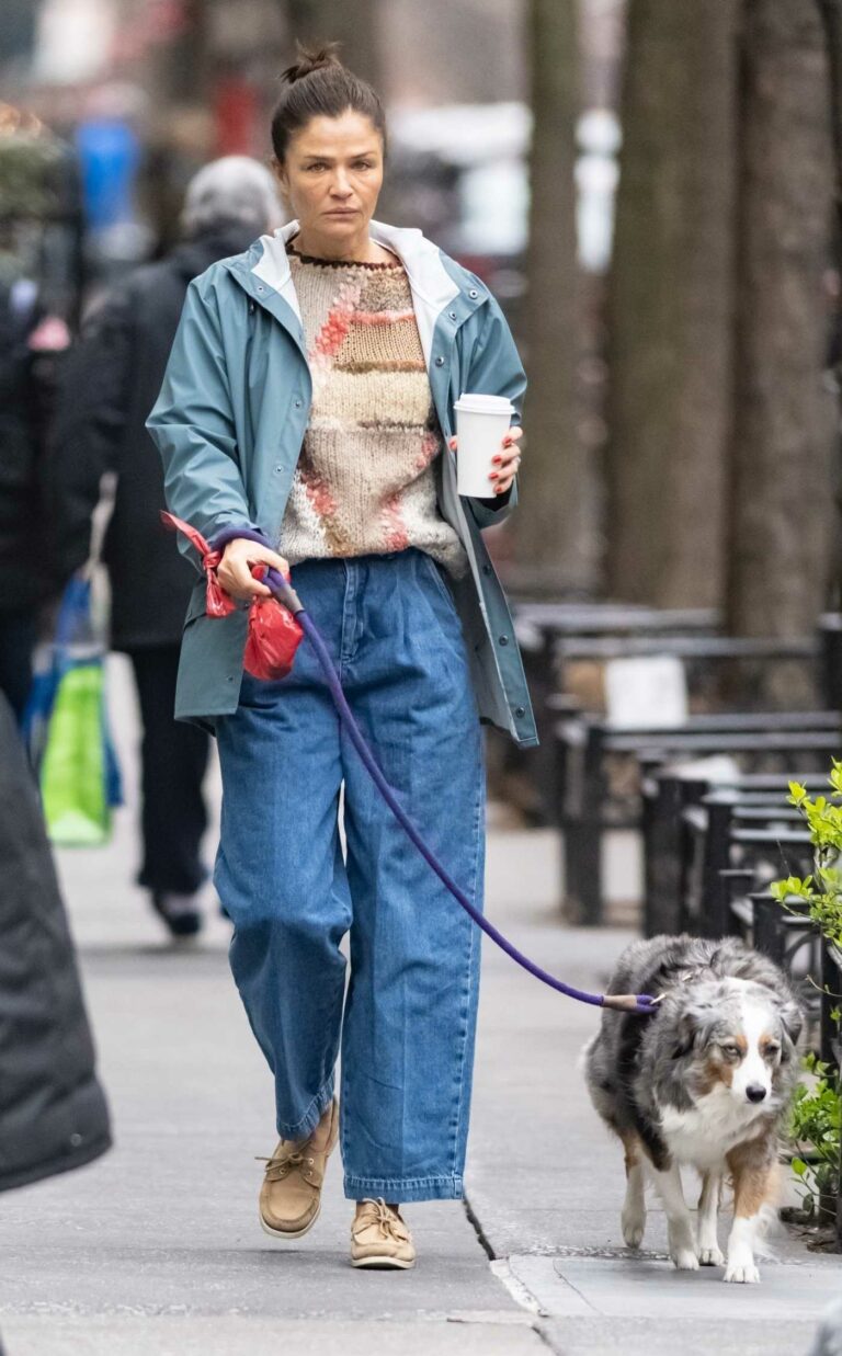 Helena Christensen in a Blue Windbreaker