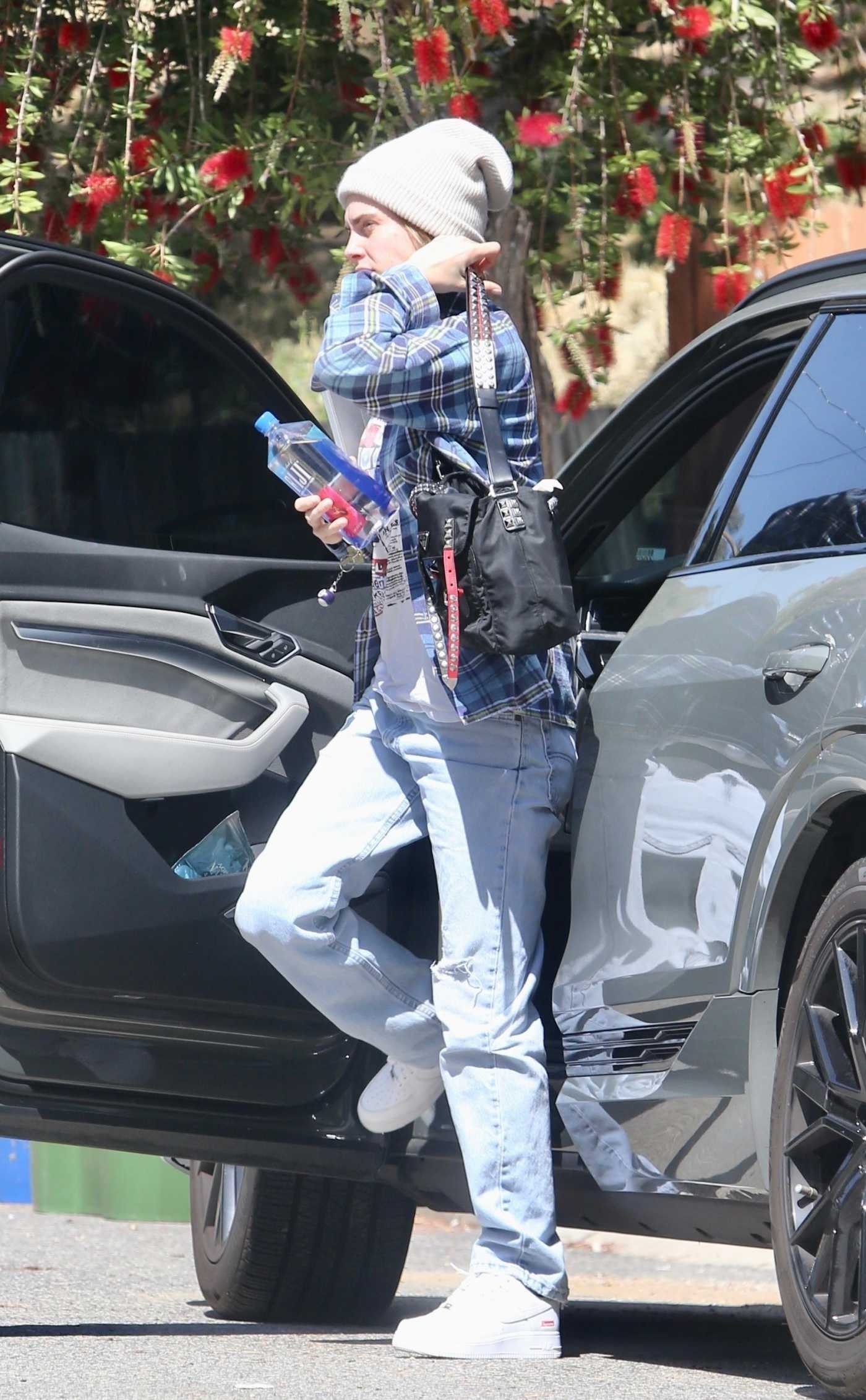 Cara Delevingne in a Blue Plaid Shirt Was Seen Out in Los Feliz 05/13/2023