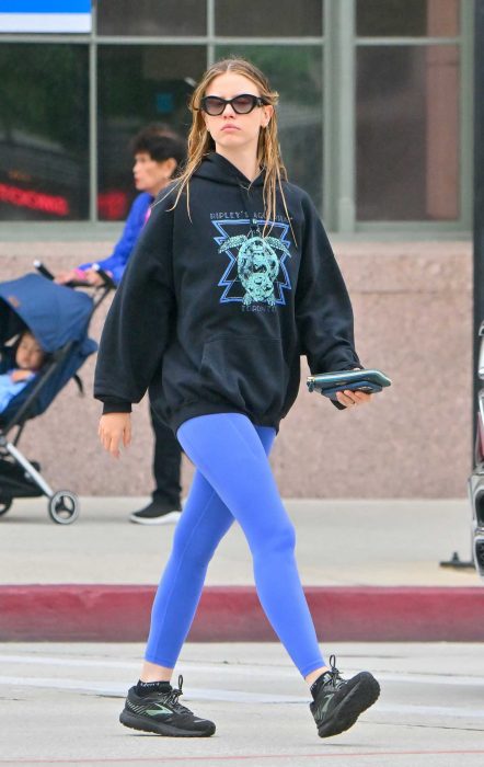 Mia Goth in a Black Hoodie
