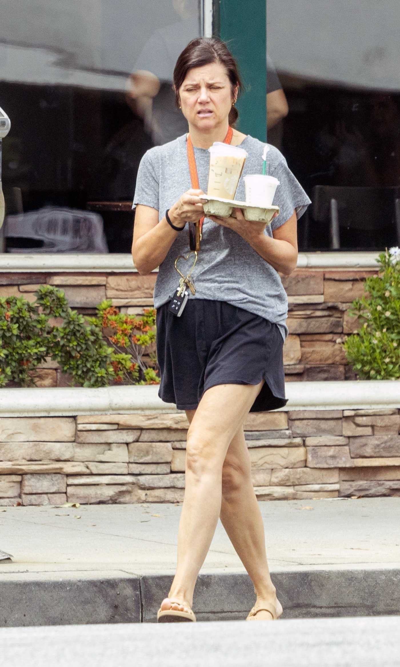 Tiffani Thiessen in a Grey Tee Goes Shopping at Target in Los Angeles 08/10/2023