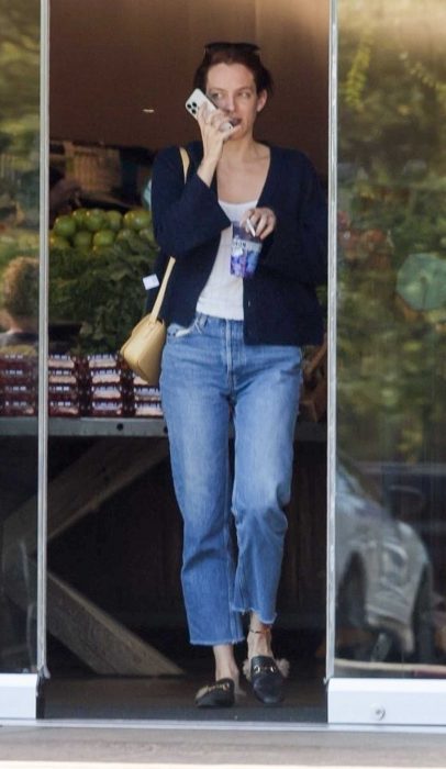 Riley Keough in a Blue Cardigan