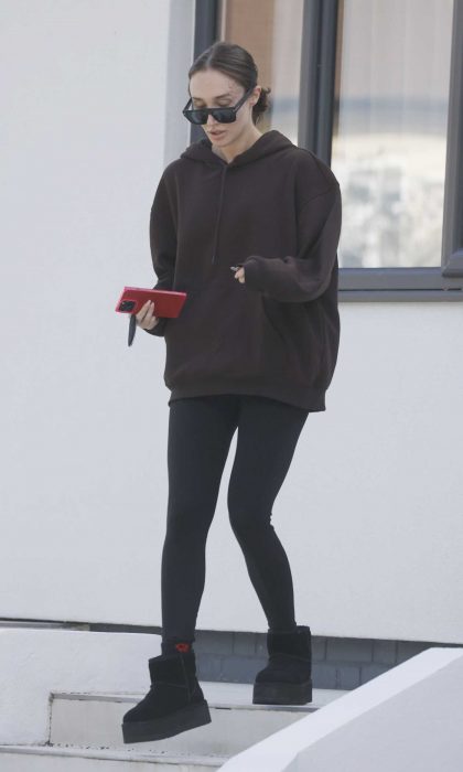 Megan Mckenna in a Brown Hoodie