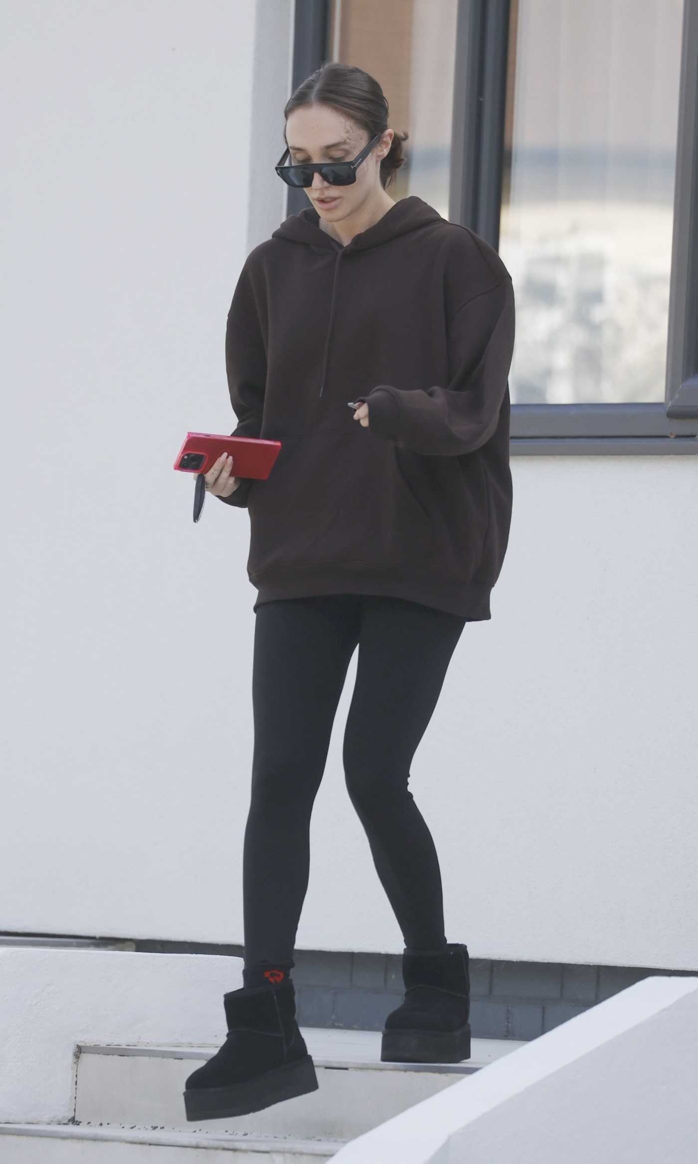 Megan Mckenna in a Brown Hoodie Was Seen Out in Essex 10/02/2023