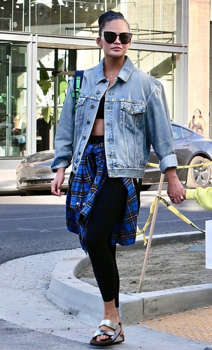 Chrissy Teigen in a Blue Denim Jacket