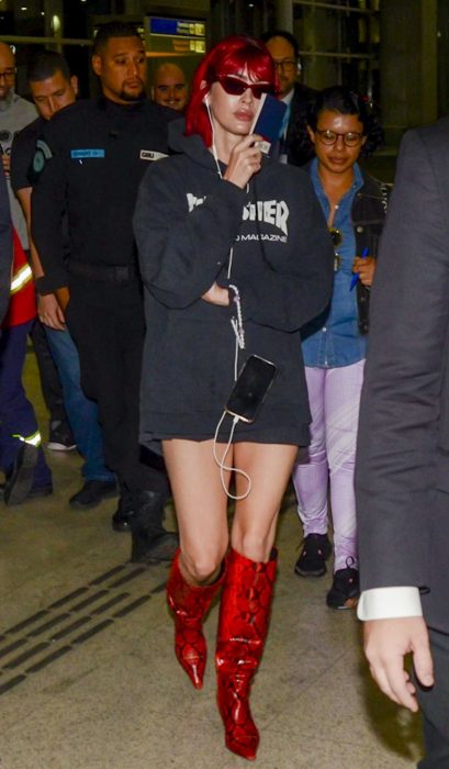 Megan Fox in a Red Snakeskin Knee-Length Boots