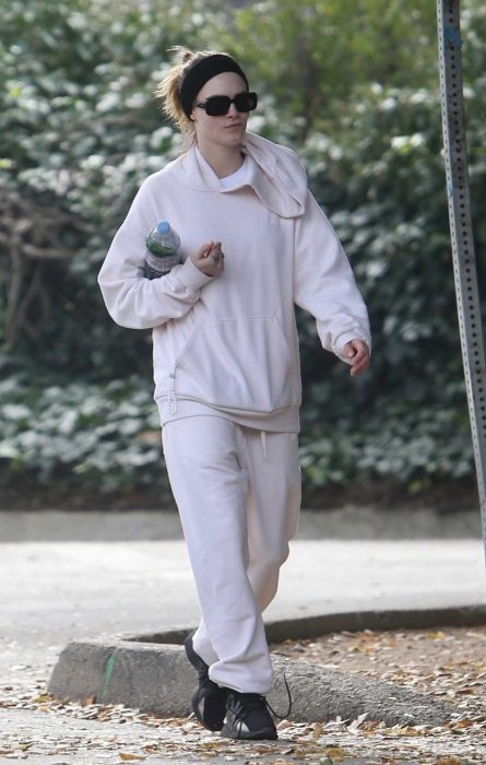 Cara Delevingne in a Black Sneakers
