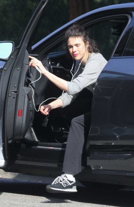 Margaret Qualley in a Grey Cardigan