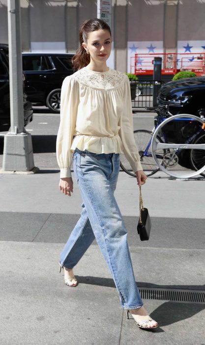 Ella Hunt in a Beige Blouse