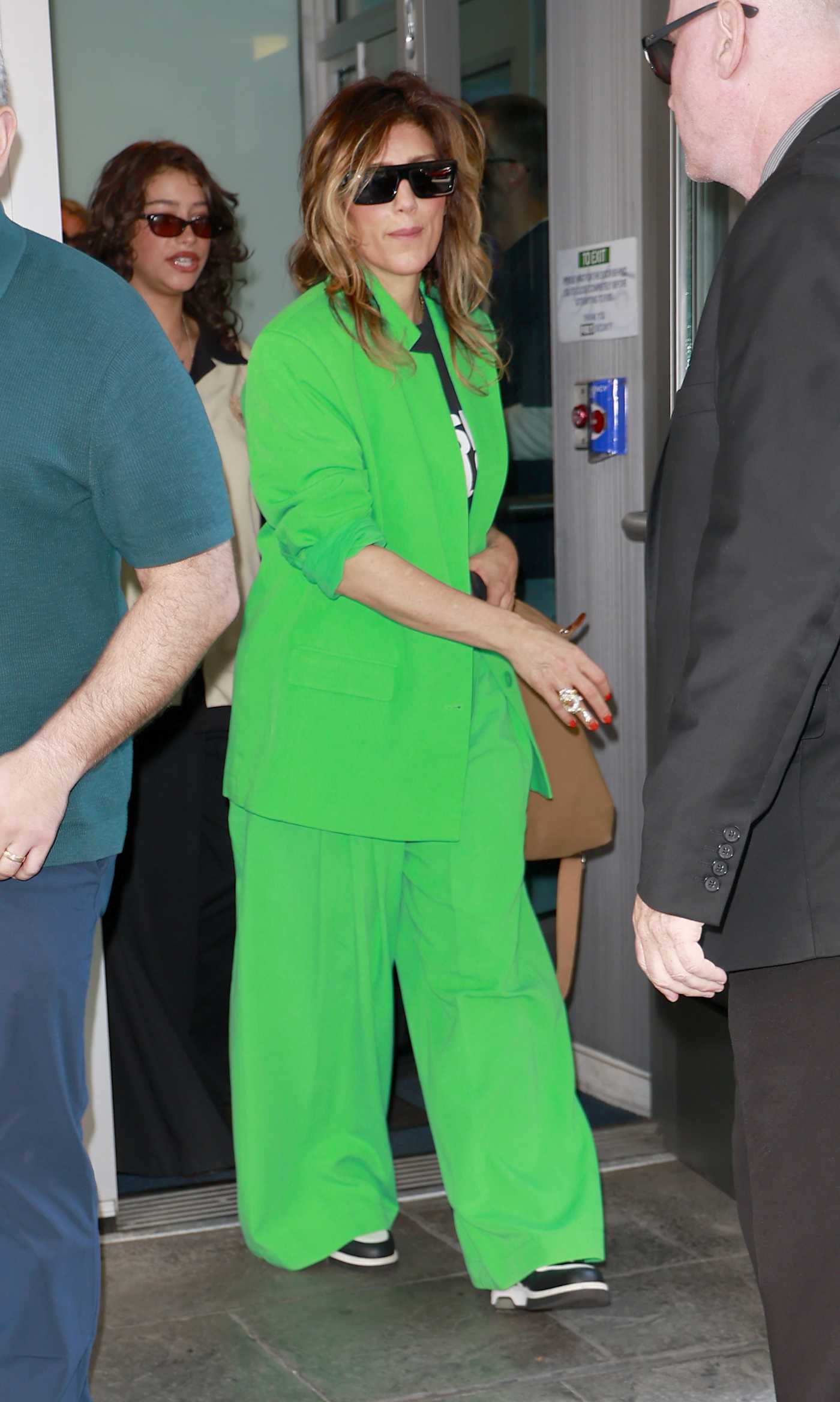 Jennifer Esposito in a Neon Green Pantsuit Was Seen Out in New York 06/14/2024