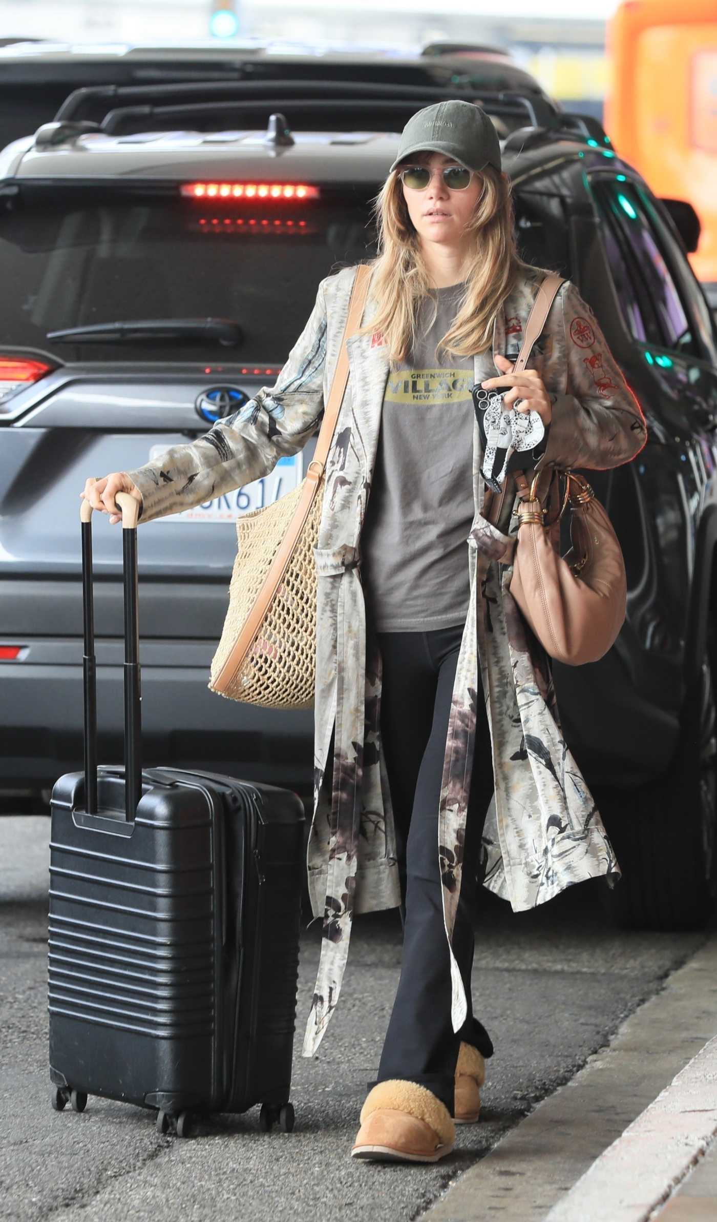 Suki Waterhouse in a Grey Tee Steps Out in Los Angeles 07/14/2024