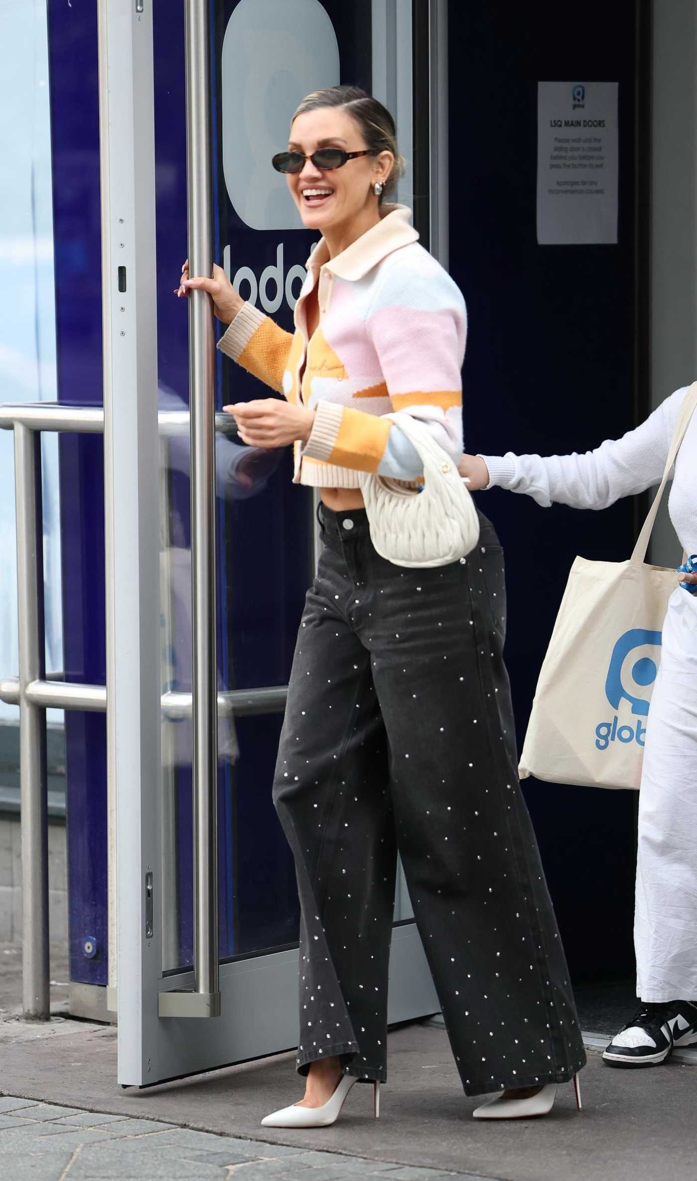 Ashley Roberts in a Black Pants Leaves the Heart Radio in London 03/27/2025
