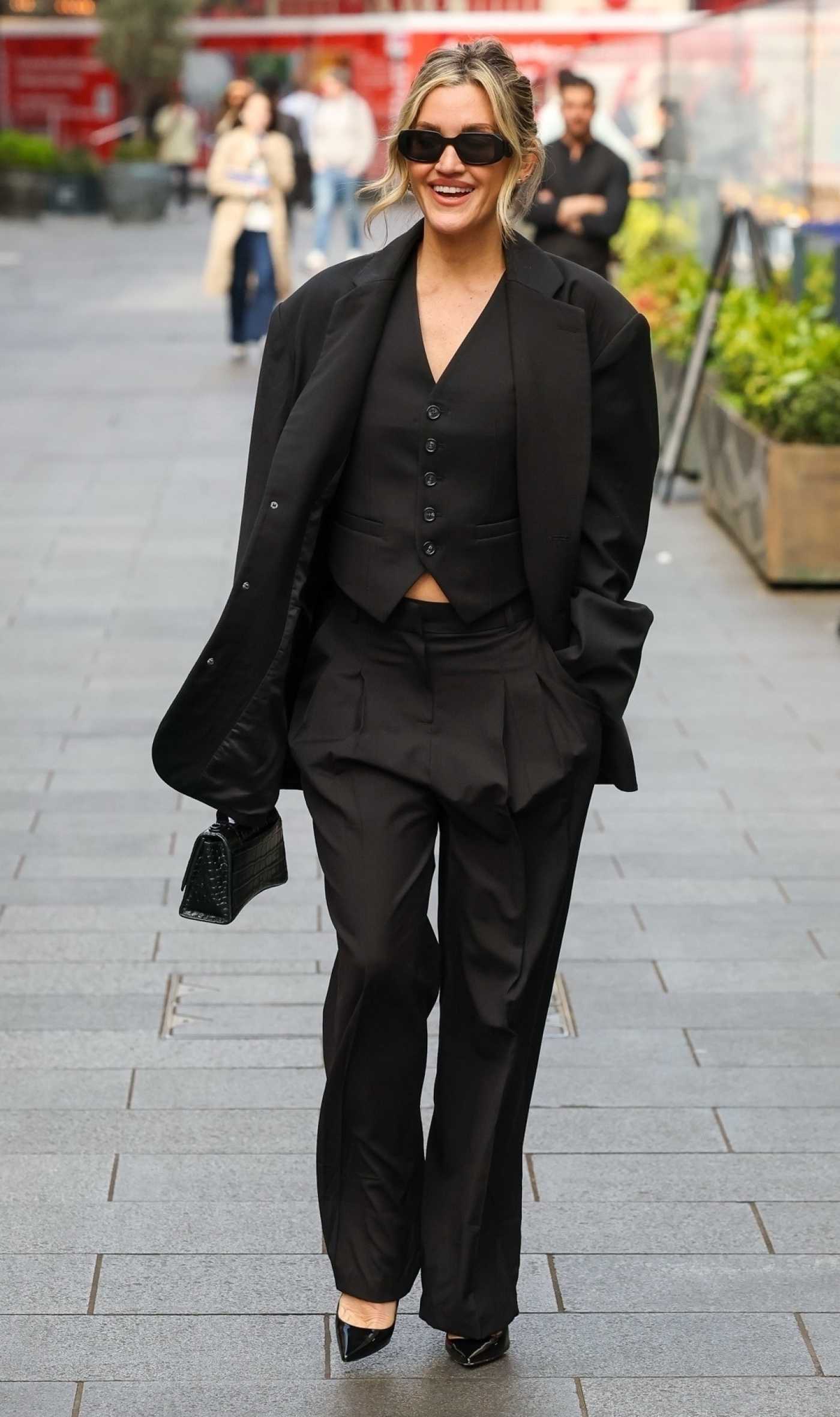 Ashley Roberts in a Black Pantsuit Leaves the Global Radio Studios in London 04/15/2025