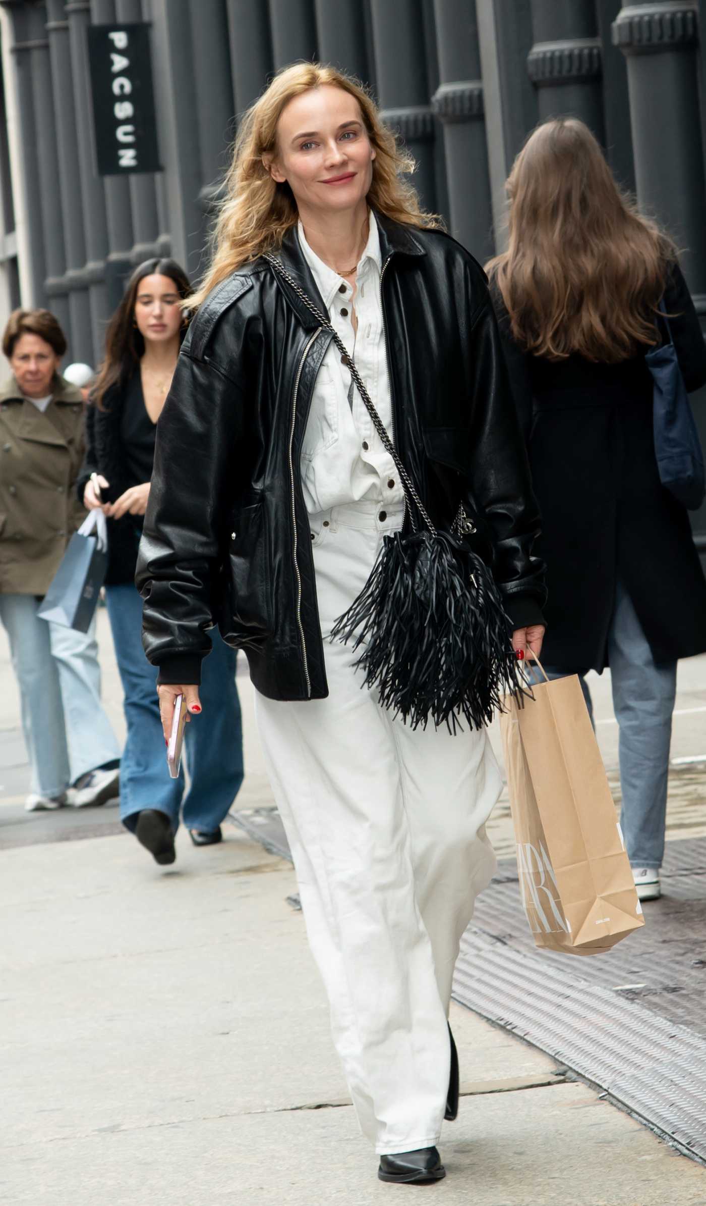 Diane Kruger in a White Pants Shops at Zara Store in NYC 04/14/2025